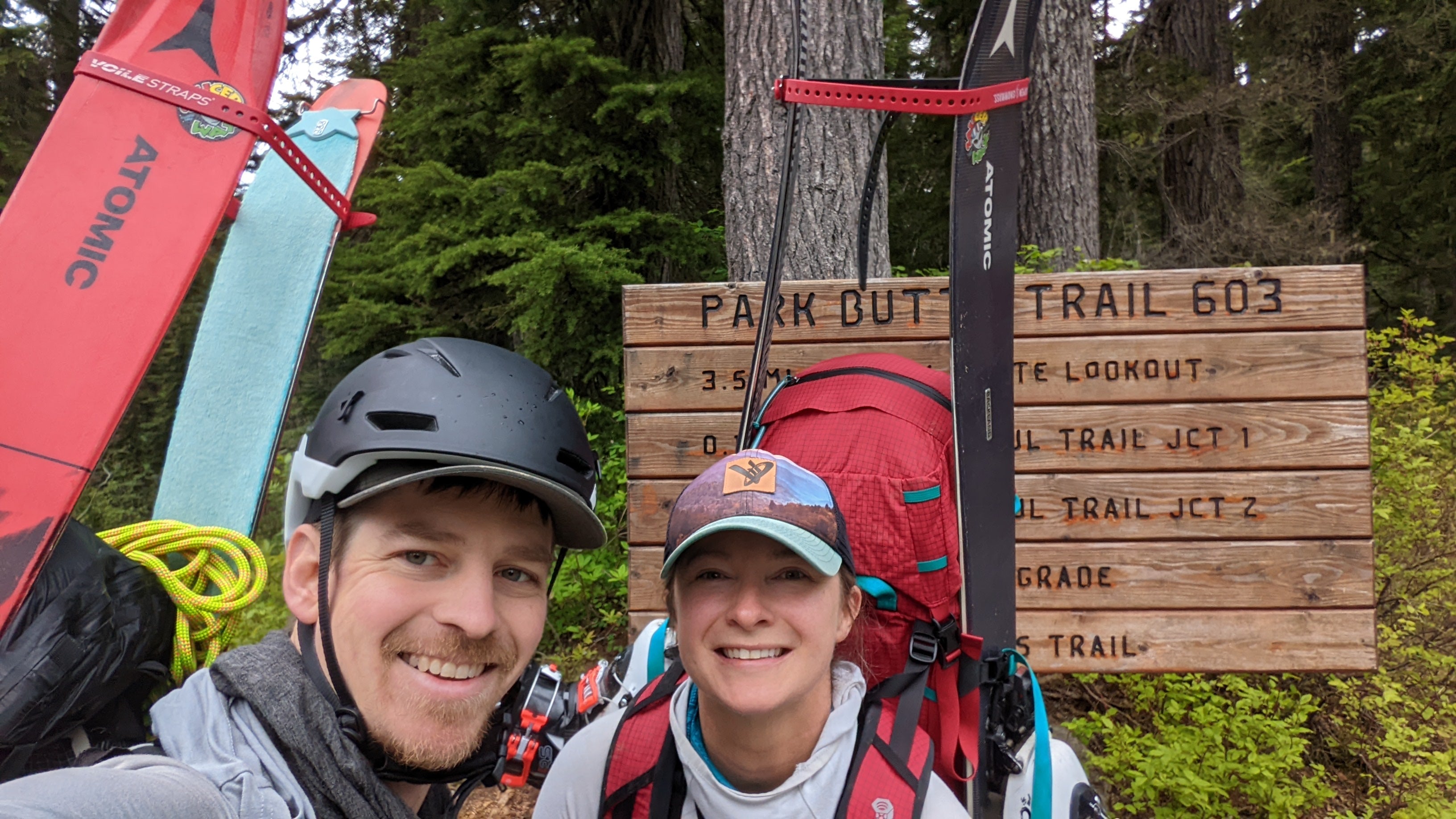 2 people at the bottom of a hike