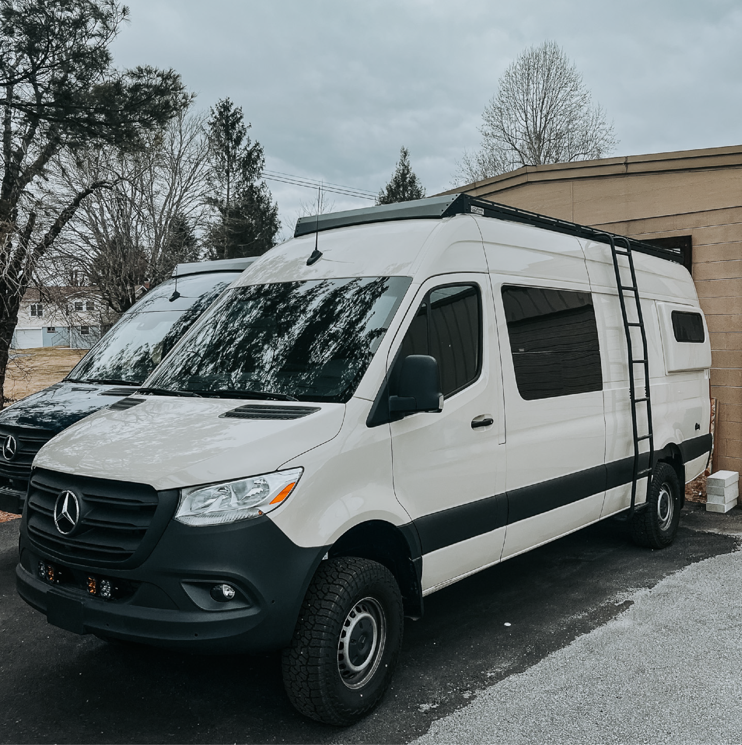 Mercedes sprinter roof rack parked